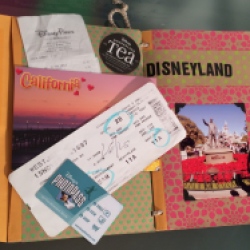 Storing extra Disneyland souvenirs in an envelope notebook